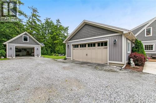 double car garage and 20 x 29 detached garage/shop with loft storage - 59 Decou Road, Simcoe, ON 