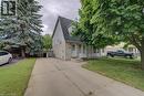 Two-story property featuring light brick and horizontal siding - 854 Elgin Street N, Cambridge, ON 
