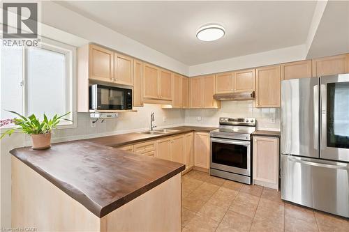119 Rossmore Court, London, ON - Indoor Photo Showing Kitchen With Double Sink