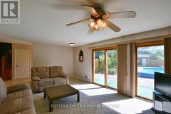 Rec Room With Large Windows and Patio Doors - 