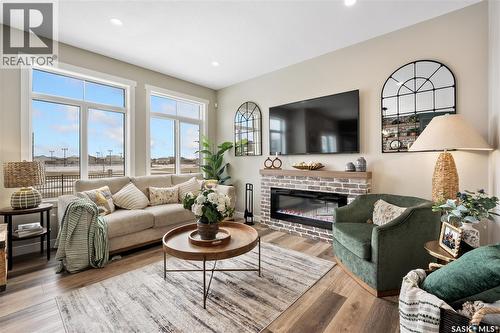 958 Yuel Bend, Saskatoon, SK - Indoor Photo Showing Living Room With Fireplace