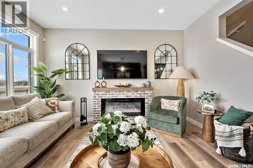 958 Yuel Bend, Saskatoon, SK - Indoor Photo Showing Living Room With Fireplace
