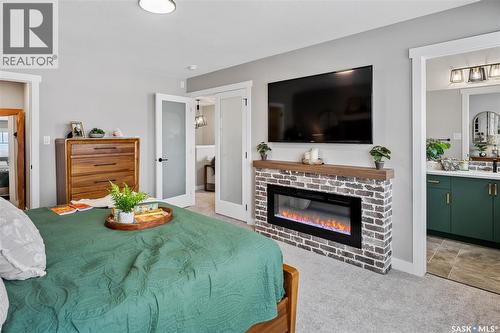 958 Yuel Bend, Saskatoon, SK - Indoor Photo Showing Living Room With Fireplace
