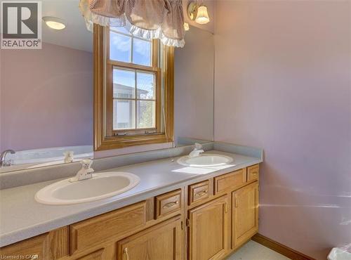 Dual sinks in the ensuite make mornings easier, with plenty of space for both you and your partner. - 42 Donly Drive S Unit# 2, Simcoe, ON 