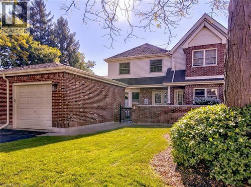 Your own garage and two-story condo—ideal for families who need space and storage. - 42 Donly Drive S Unit# 2, Simcoe, ON 
