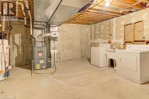 Laundry is convenient with options in the basement or main floor, allowing flexibility for your household. - 42 Donly Drive S Unit# 2, Simcoe, ON 