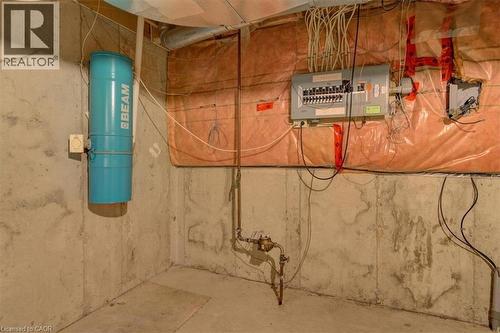 Modern conveniences like a central vacuum and 100 amp electric breaker panel make maintenance a breeze. - 42 Donly Drive S Unit# 2, Simcoe, ON 