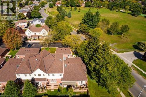 Your private deck and yard, as seen from above, offer the perfect space for outdoor relaxation and entertaining. - 42 Donly Drive S Unit# 2, Simcoe, ON 