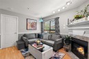 202-7 Gorge Rd West, Saanich, BC  - Indoor Photo Showing Living Room With Fireplace 