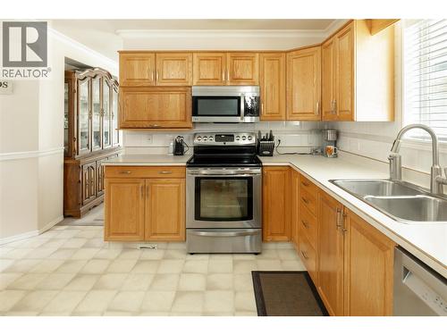 527 Yates Road Unit# 13, Kelowna, BC - Indoor Photo Showing Kitchen With Stainless Steel Kitchen With Double Sink