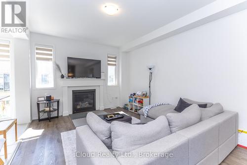 302 Calla Point, Milton, ON - Indoor Photo Showing Living Room With Fireplace
