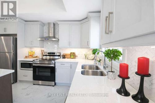4403 Belmont Avenue, Lakeshore, ON - Indoor Photo Showing Kitchen With Stainless Steel Kitchen With Double Sink With Upgraded Kitchen