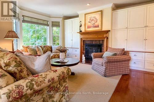 202 Snowbridge Way, Blue Mountains, ON - Indoor Photo Showing Living Room With Fireplace