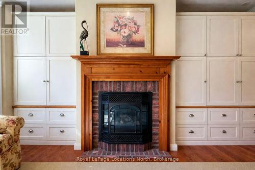 202 Snowbridge Way, Blue Mountains, ON - Indoor Photo Showing Living Room With Fireplace