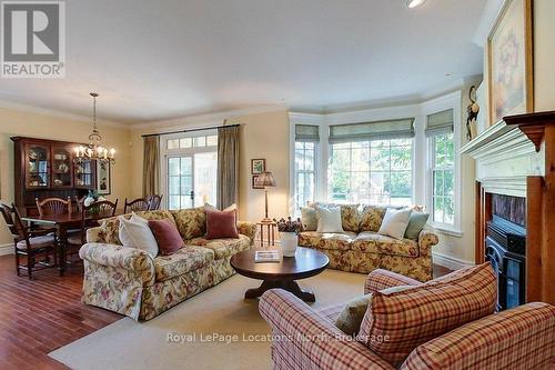 202 Snowbridge Way, Blue Mountains, ON - Indoor Photo Showing Living Room With Fireplace