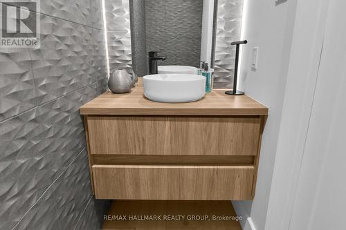 Main Level - Powder Room with wave tile - 2167 Rice Avenue, Ottawa, ON - Indoor Photo Showing Bathroom