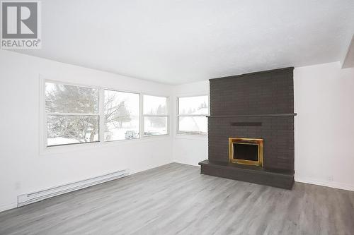 826 I Line Rd, Richards Landing, ON - Indoor Photo Showing Living Room With Fireplace