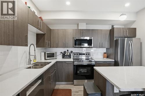 322 142 Pawlychenko Lane, Saskatoon, SK - Indoor Photo Showing Kitchen With Stainless Steel Kitchen With Double Sink With Upgraded Kitchen