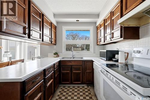158 Trifunov Crescent, Regina, SK - Indoor Photo Showing Kitchen With Double Sink