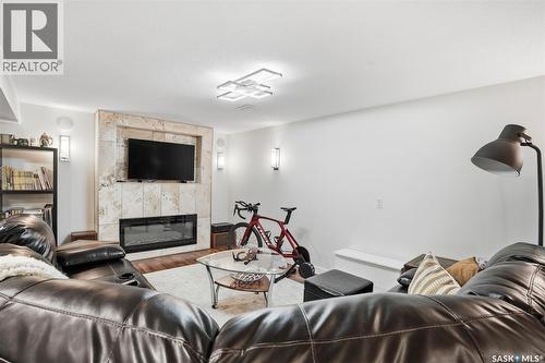 411 Auld Crescent, Saskatoon, SK - Indoor Photo Showing Living Room With Fireplace