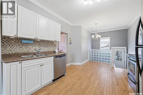 404 D Avenue S, Saskatoon, SK - Indoor Photo Showing Kitchen With Double Sink