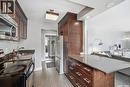 302 320 5Th Avenue N, Saskatoon, SK  - Indoor Photo Showing Kitchen With Upgraded Kitchen 