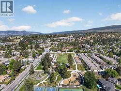 Dehart Park has an enormous grass field, playground, pump track, dog park, Pickleball courts - 