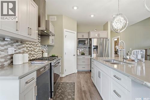 211 Burgess Bay, Saskatoon, SK - Indoor Photo Showing Kitchen With Double Sink With Upgraded Kitchen