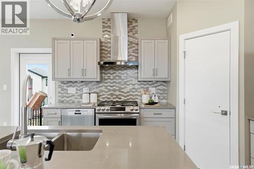 211 Burgess Bay, Saskatoon, SK - Indoor Photo Showing Kitchen With Double Sink With Upgraded Kitchen