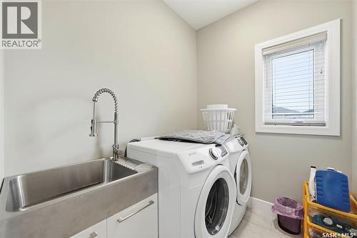 211 Burgess Bay, Saskatoon, SK - Indoor Photo Showing Laundry Room