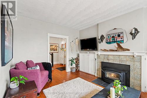9' ceiling and hardwood floor. - 1 Burchell Boulevard, Perth, ON - Indoor Photo Showing Living Room With Fireplace