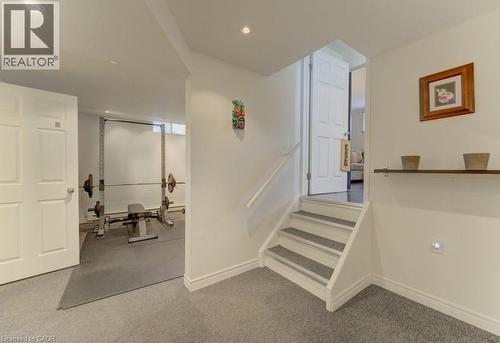 Lower level featuring carpeted flooring and recessed lighting - 108 Clearwater Crescent, Waterloo, ON - Indoor Photo Showing Other Room