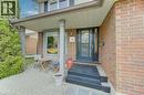 Brick exterior with an inviting covered porch featuring gray columns and a bay window - 108 Clearwater Crescent, Waterloo, ON  - Outdoor With Exterior 