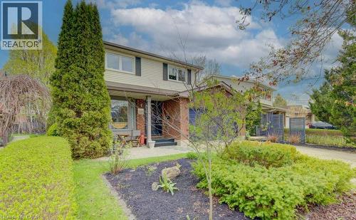 Two-story residence featuring brick and siding exterior construction - 108 Clearwater Crescent, Waterloo, ON - Outdoor