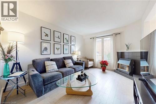 62 Como Place, Hamilton, ON - Indoor Photo Showing Living Room With Fireplace