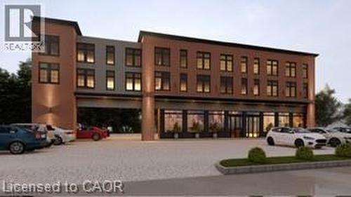 Develpment Plans - Modern multi-story building featuring brick and panel facades, large windows, and ground-level retail spaces with expansive glass storefronts - 3052 New Street, Burlington, ON 