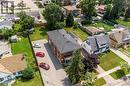 Multi-unit residential property featuring a brick exterior and a dark shingle roof - 43 Sixth Avenue, Kitchener, ON  - Outdoor 