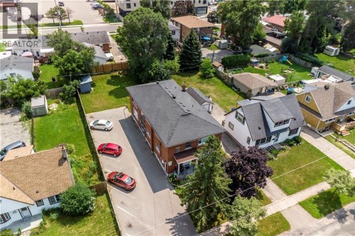 Multi-unit residential property featuring a brick exterior and a dark shingle roof - 43 Sixth Avenue, Kitchener, ON - Outdoor