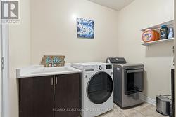 Laundry with Access to Garage - 