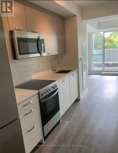 417 - 2301 Danforth Avenue, Toronto, ON - Indoor Photo Showing Kitchen With Stainless Steel Kitchen