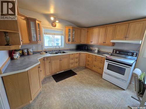 706 Main Street, Kipling, SK - Indoor Photo Showing Kitchen With Double Sink