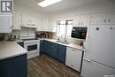 104 2013 Arlington Avenue, Saskatoon, SK  - Indoor Photo Showing Kitchen With Double Sink 