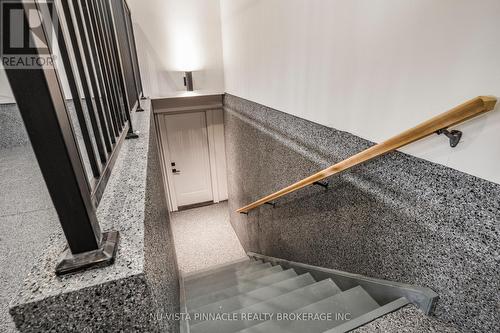 Stairs through garage to basement - 4108 Fallingbrook Road, London South (South V), ON - Indoor Photo Showing Other Room