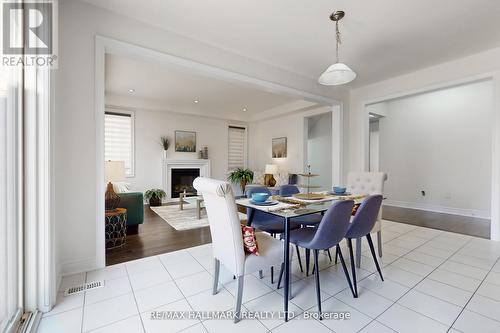 9 Lyle Way E, Brampton, ON - Indoor Photo Showing Dining Room With Fireplace