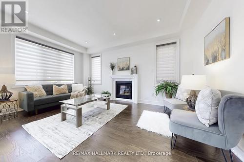 9 Lyle Way E, Brampton, ON - Indoor Photo Showing Living Room With Fireplace