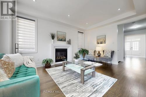 9 Lyle Way E, Brampton, ON - Indoor Photo Showing Living Room With Fireplace