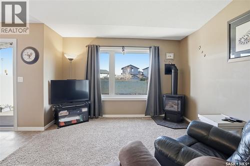19 4101 Preston Crescent, Regina, SK - Indoor Photo Showing Living Room With Fireplace