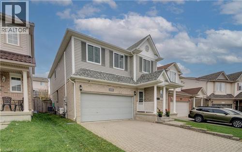 699 Commonwealth Crescent, Kitchener, ON - Outdoor With Facade