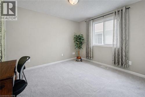 Bedroom 1 - Digitally altered wall colour - 699 Commonwealth Crescent, Kitchener, ON - Indoor Photo Showing Other Room