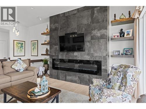 3643 Wild Rose Road, Kelowna, BC - Indoor Photo Showing Living Room With Fireplace